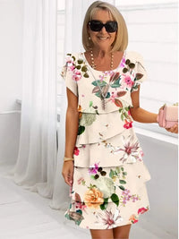 Camille – An elegant, flowing dress with ruffles