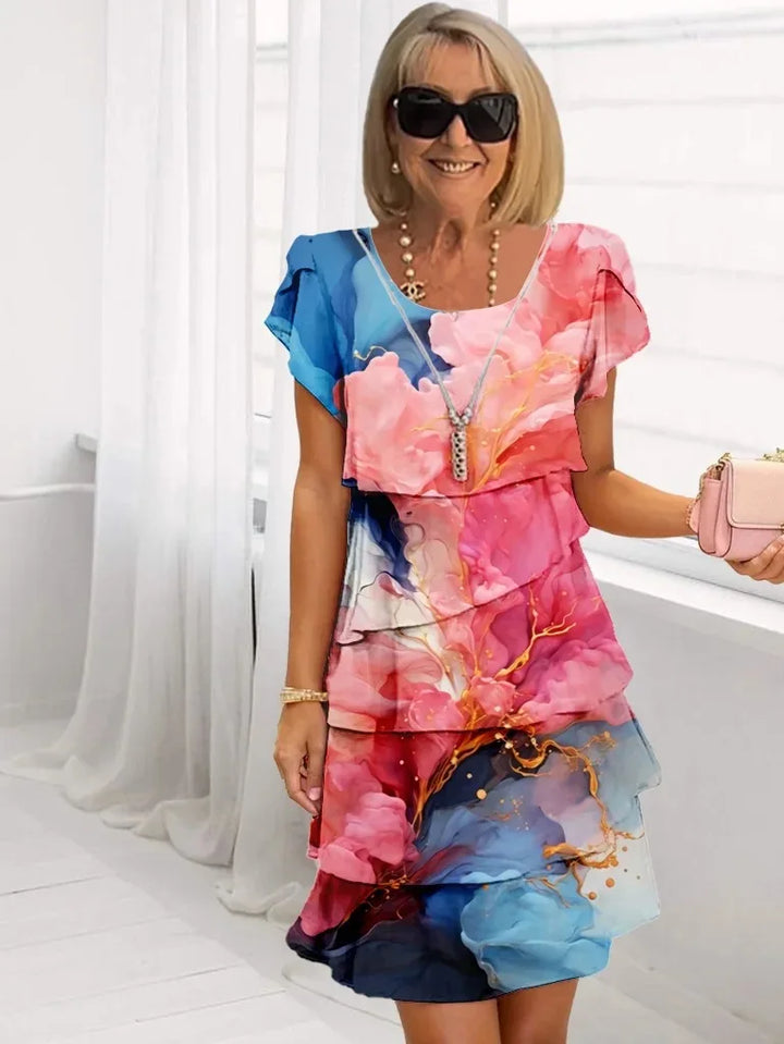 Camille – An elegant, flowing dress with ruffles
