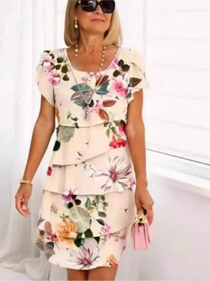 Camille – An elegant, flowing dress with ruffles