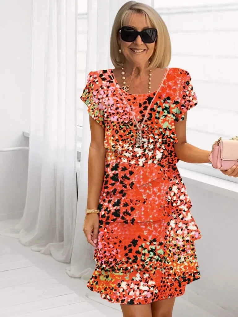 Camille – An elegant, flowing dress with ruffles