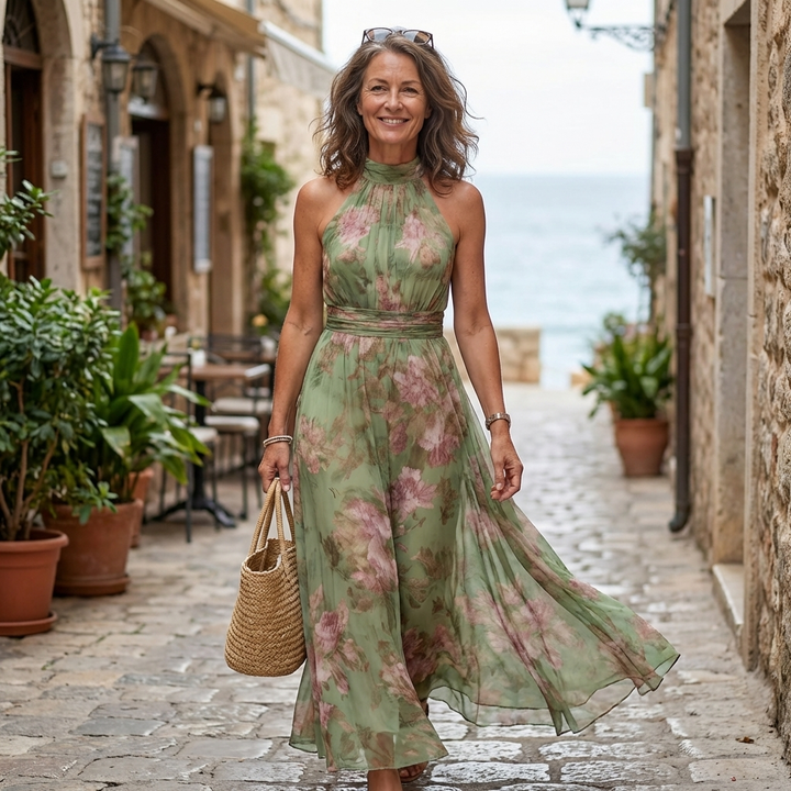Serena™ | Long green dress with a floral print and a halter neck