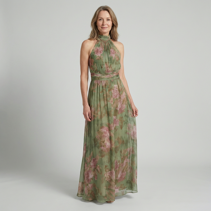 Serena™ | Long green dress with a floral print and a halter neck