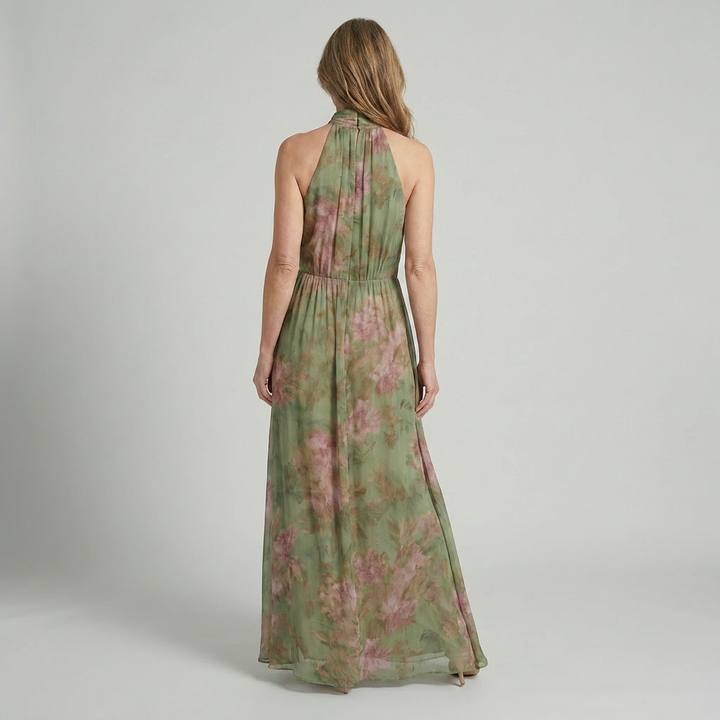 Serena™ | Long green dress with a floral print and a halter neck